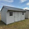 Gray Quaker shed in shed lot