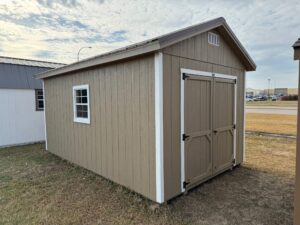 Tan Ranch shed in shed lot