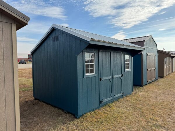 Teal Quaker shed in shed lot