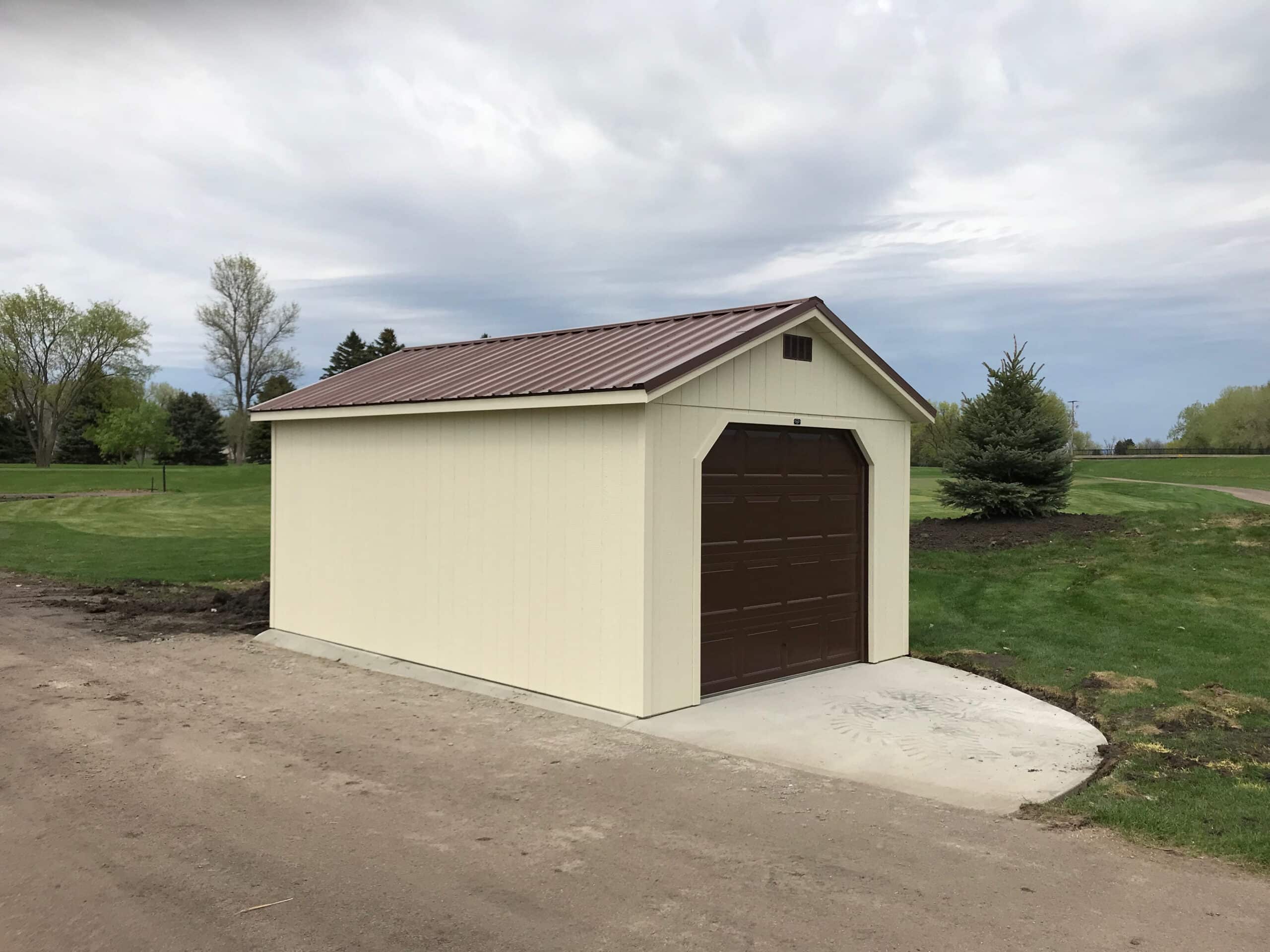 Beige a-frame garage storage shed