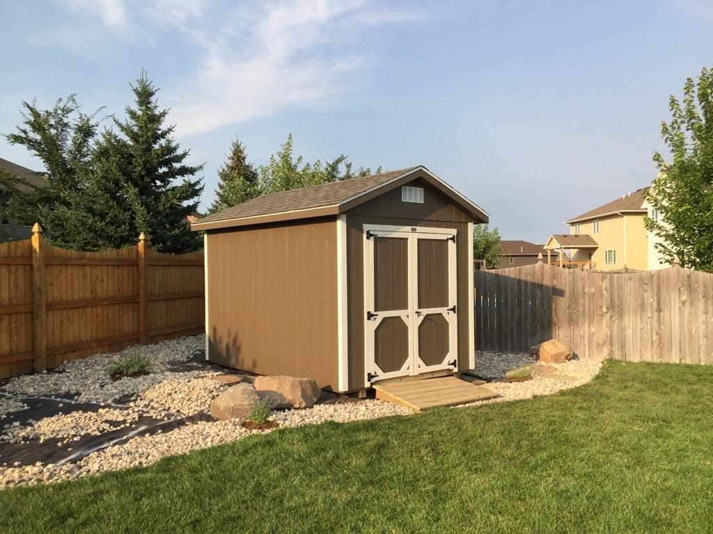 A-frame storage shed in backyard