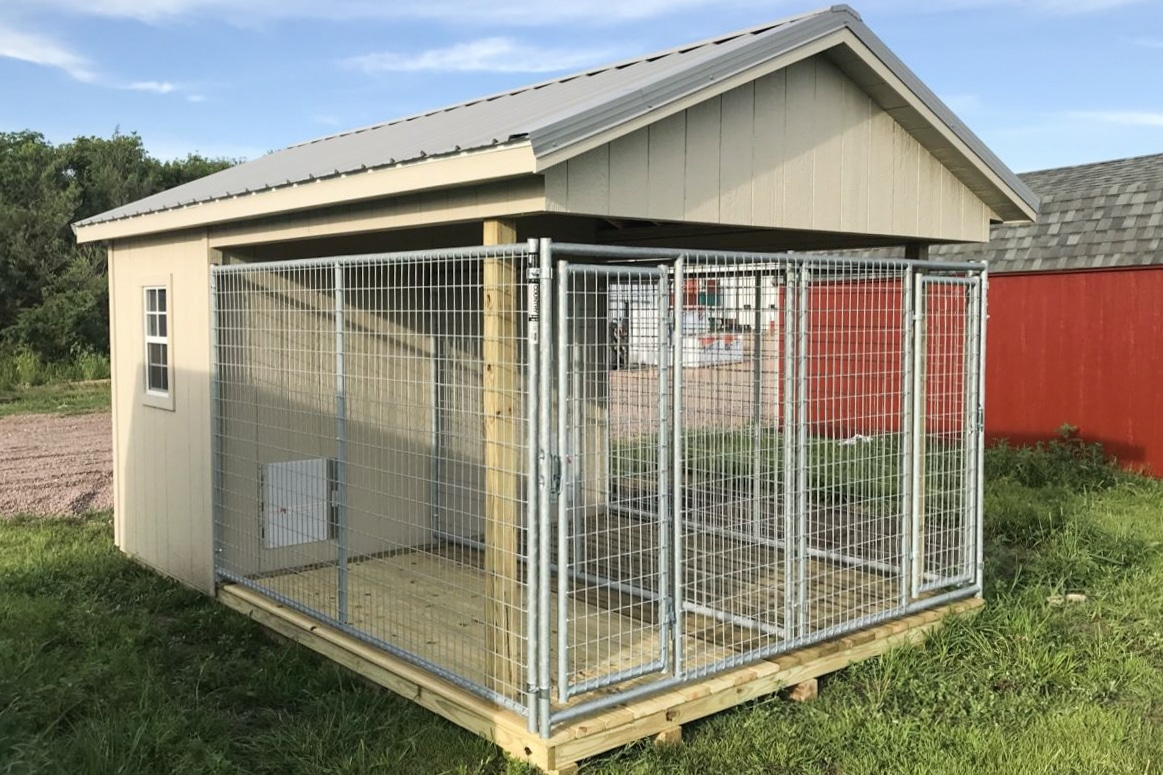 Dog kennel in storage shed lot
