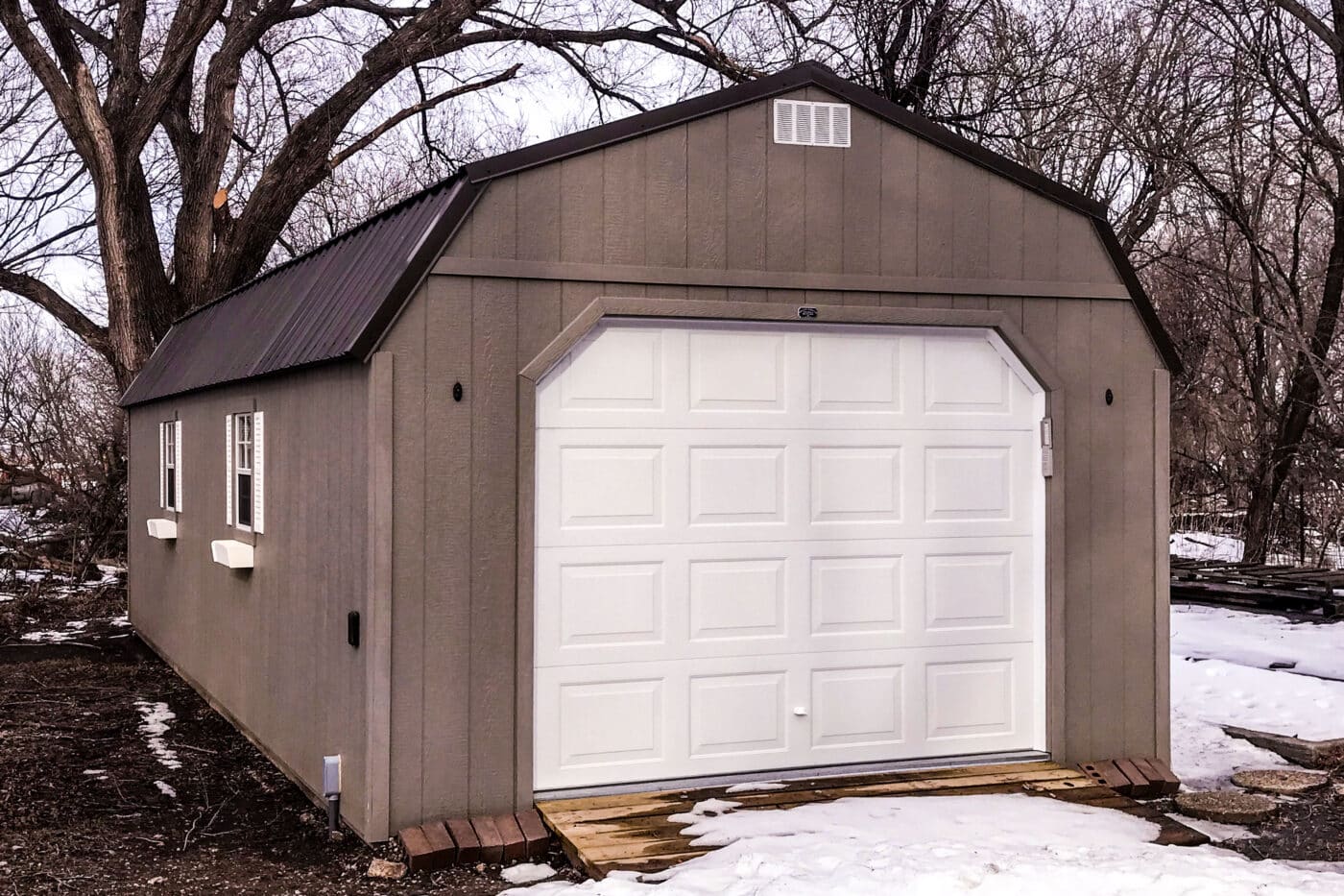 Gray high barn Prefab Garages Shed in backyard