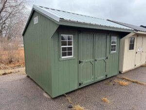 Green Quaker shed in shed lot