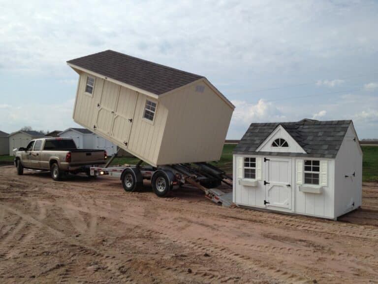 Sheds being unloaded from truck