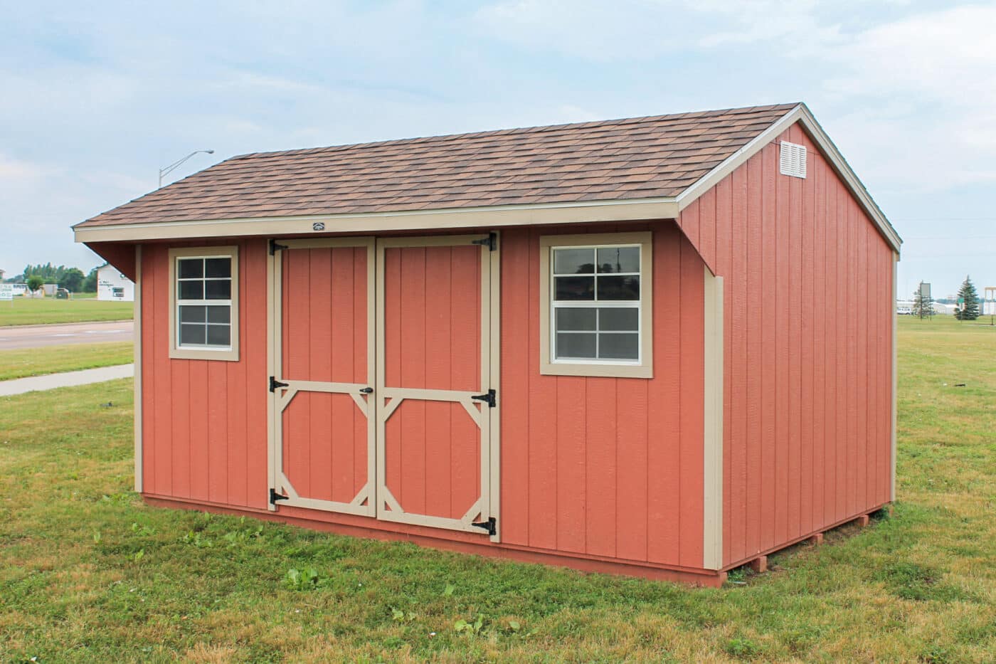 Red Quaker Prefab Shed in field
