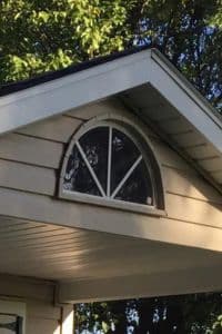 Sunburst Window on side of shed