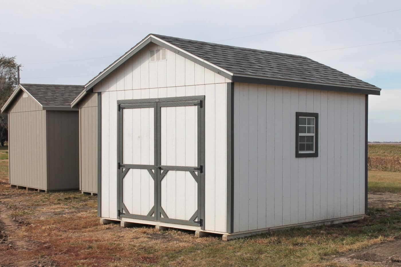 White Ranch Style gable shed in portable shed lot