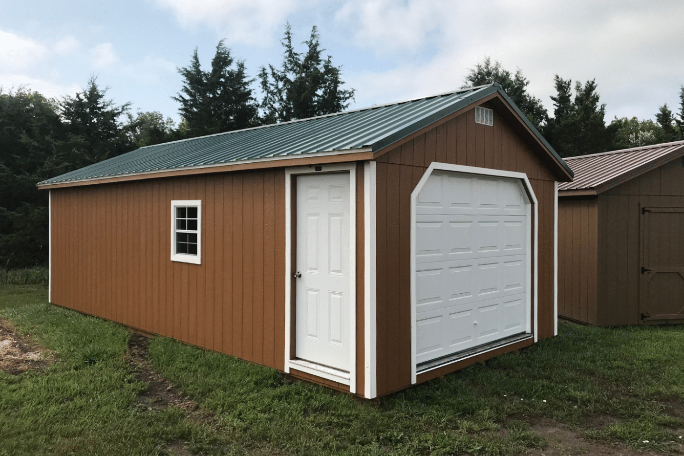 brown garage shed with green roof in hartford sd