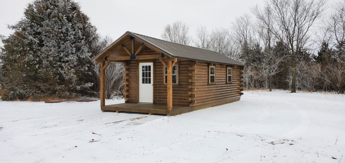 Log cabin in snow.