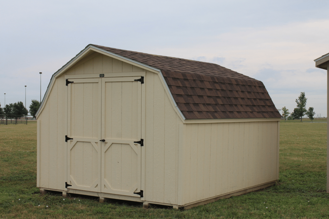 beige low barn shed in hartford sd