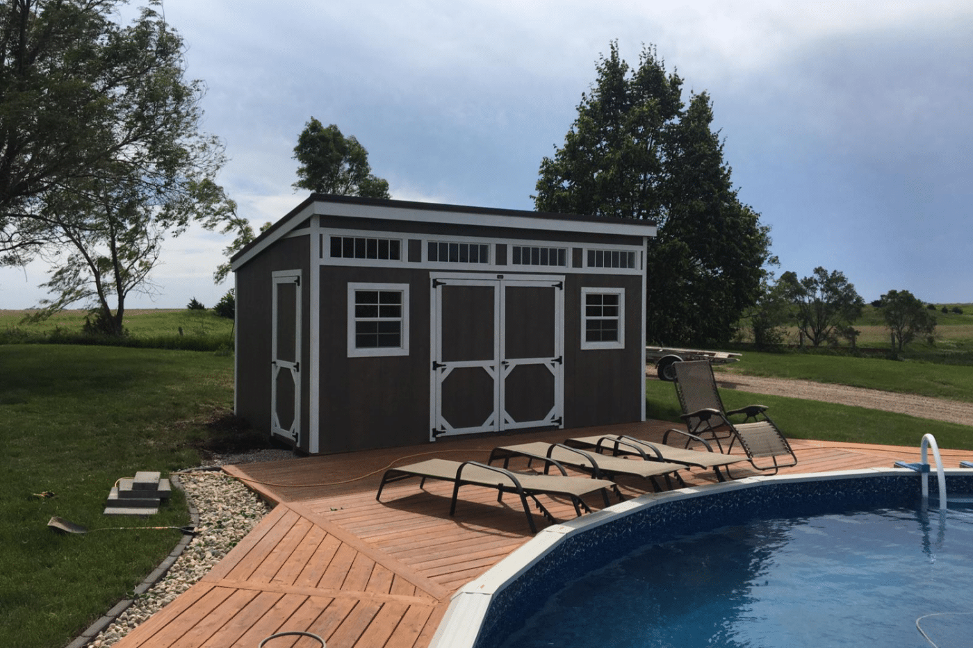 grey studio shed near pool in hartford sd